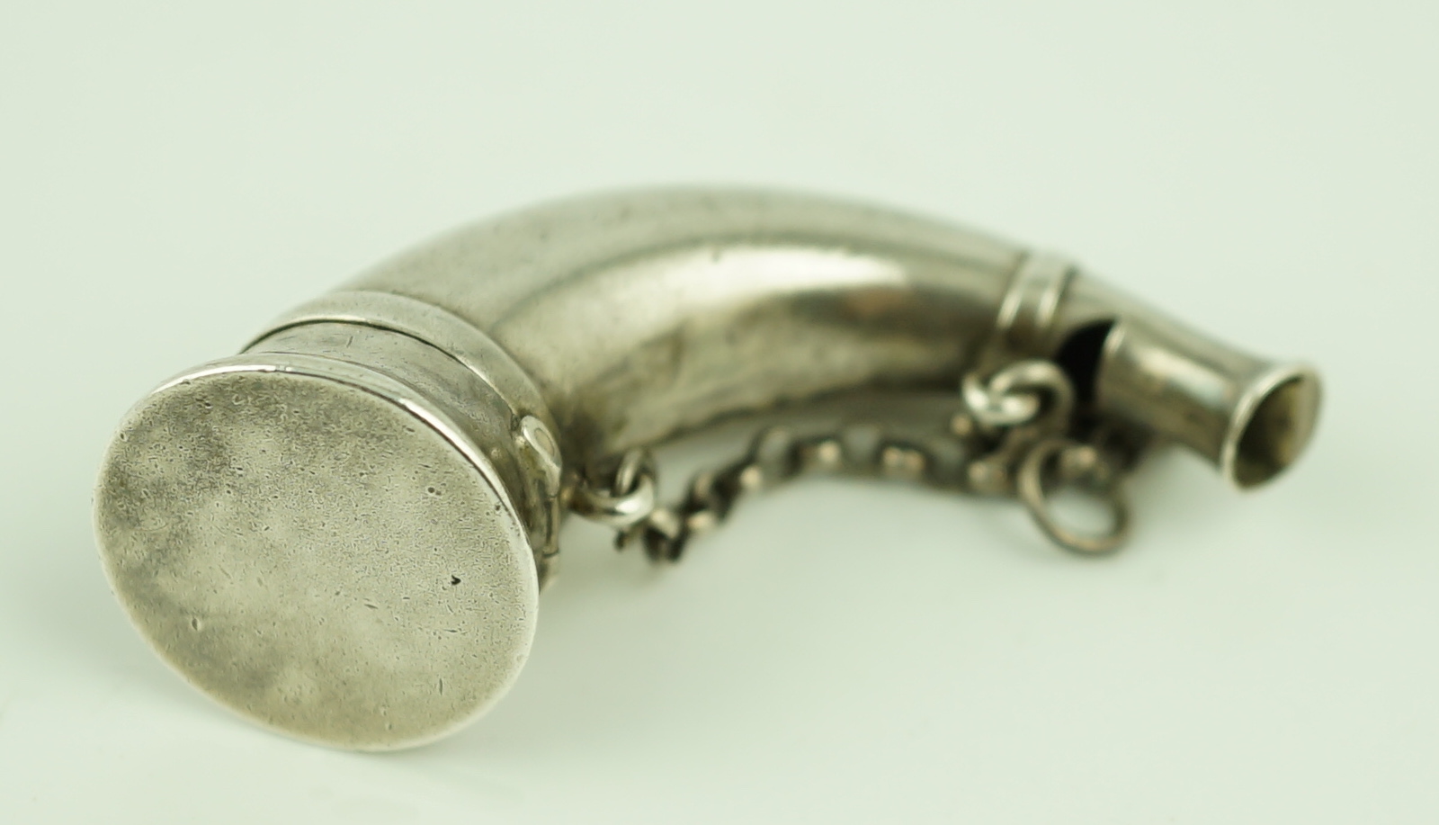 A late Victorian silver combination horn shape vinaigrette and whistle, by Sampson Mordan & Co.